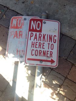Two No Parking signs