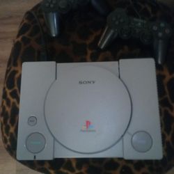 Sony PlayStation With Two Controllers