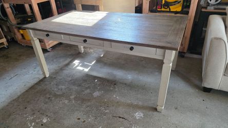 Dining Room Table with 6 drawers for extra storage.