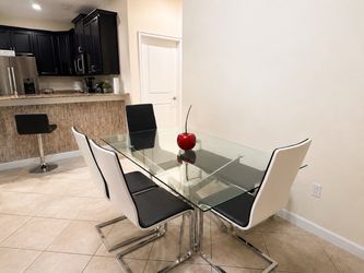 Glass Top Dining Table with 4 Modern Chairs