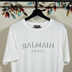 BALMAIN WHITE COTTON LOGO VELVET PRINTED T-SHIRT SS24, Visit Our Profile For More  Items Available…