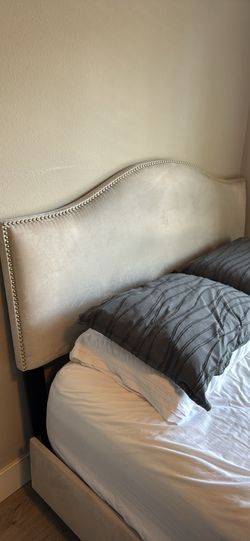 Queen sized bed with low profile box spring