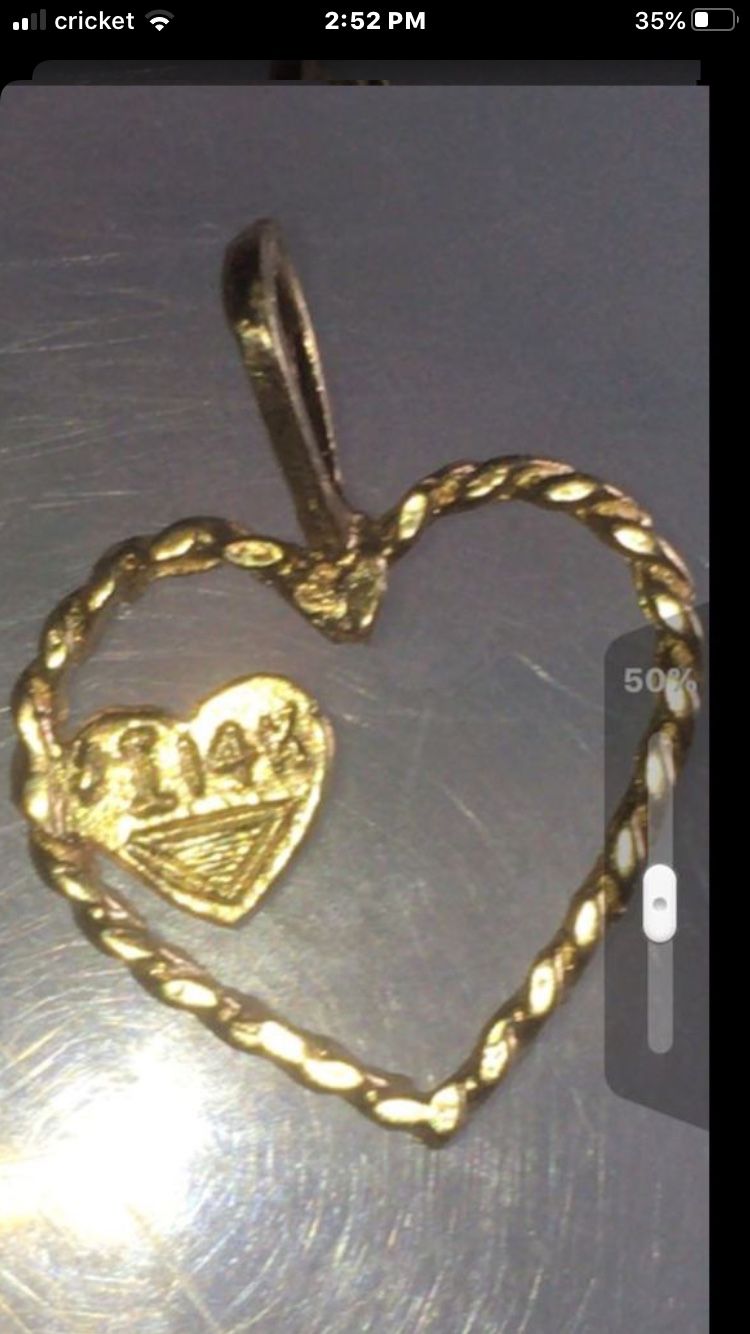 14k Real Gold Diamond cut charm. $17. East Dundee. (Sells for $49 in stores)