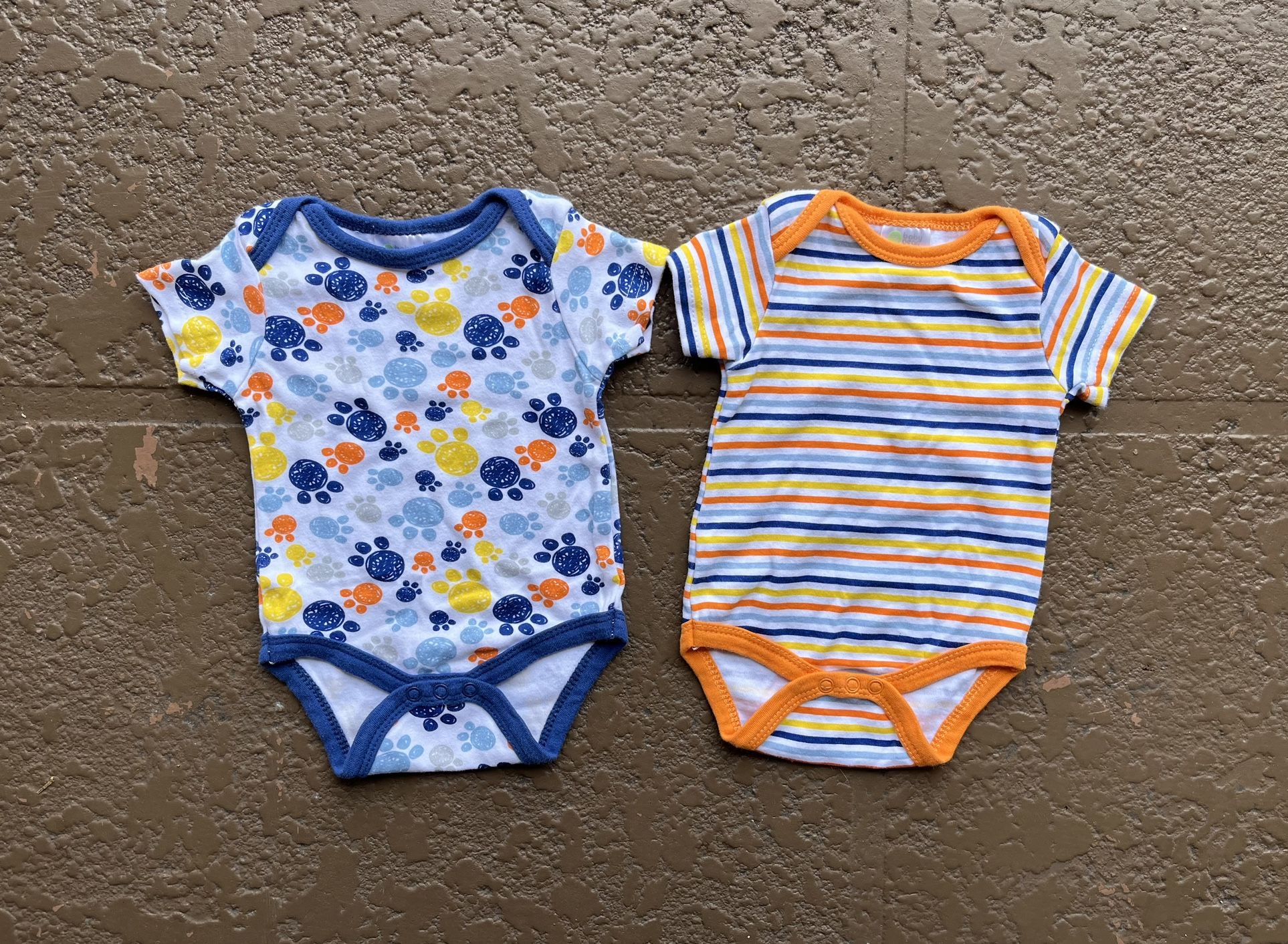 2 like new Baby Gear onesies, size 3-6 months