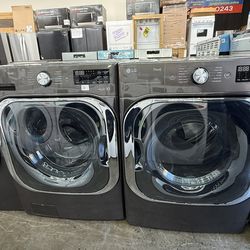 Brand new LG jumbo charcoal Stainless steel front load washer and gas dryer set