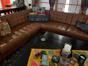 Tan leather sectional sofa