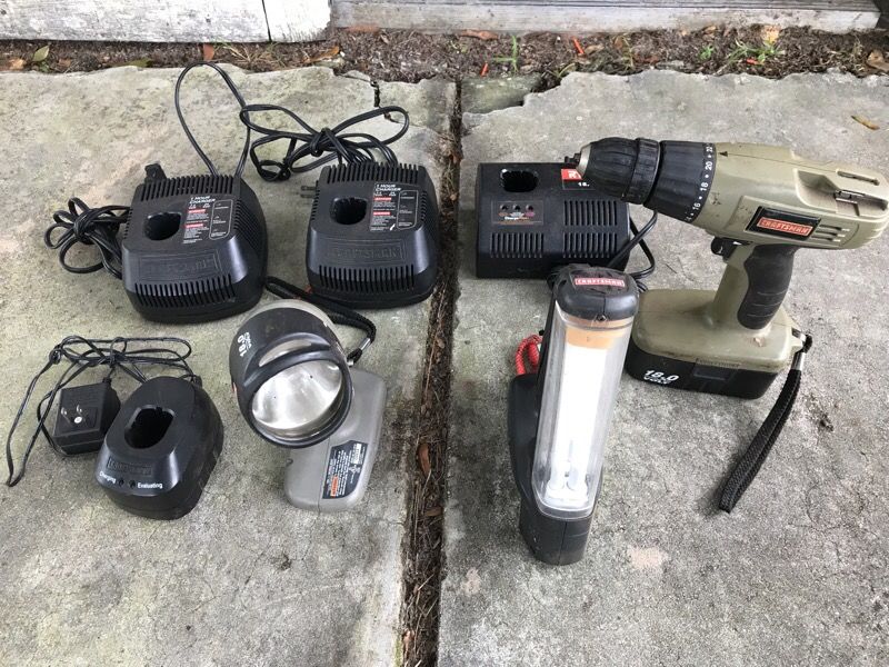 Assorted chargers, lights and drill