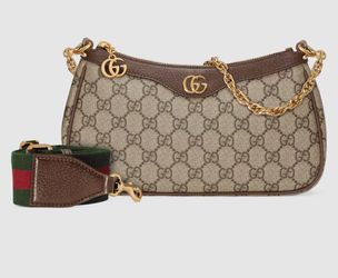Hermosa cartera de mujer nueva con su guarda polvo bolsa