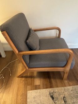 Armchair with throw pillow