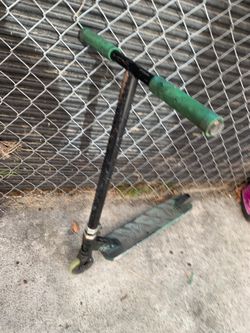 Black scooter brand is Madd gear