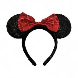 Disney Parks Minnie Mouse sequined ear headband with a red sequin bow