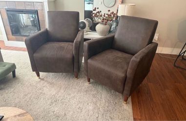 Two Brown Faux Leather Chairs