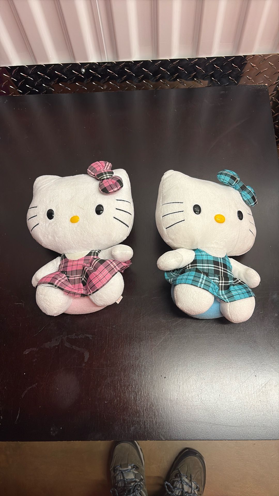 Two Hello kitty Stuffed Animals