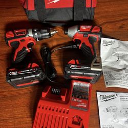 MILWAUKEE COMBO KIT  M18 18V Lithium-Ion Cordless Drill Driver/Impact Driver Combo Kit (2-Tool) W/ Two 1.5Ah Batteries, Charger Tool