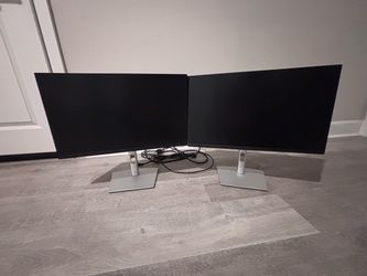 Pair of Dell Ultrasharp Computer Monitors with Stands