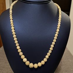 Shell beaded Pearl necklace. Very pretty. From clasp to clasp is about 20”.(salt water pearl). In good condition 