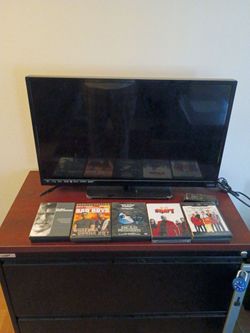 40 inch TV with 10 movies