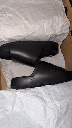 Brand new Nike slides size 9.5 W