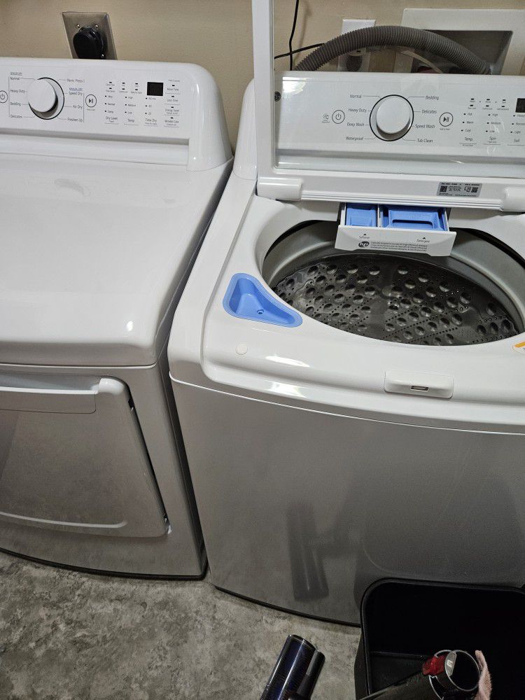 LG washer and dryer 5 Month old with 5 year warranty.
