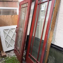 Wood red two piece sliding glass door with frame