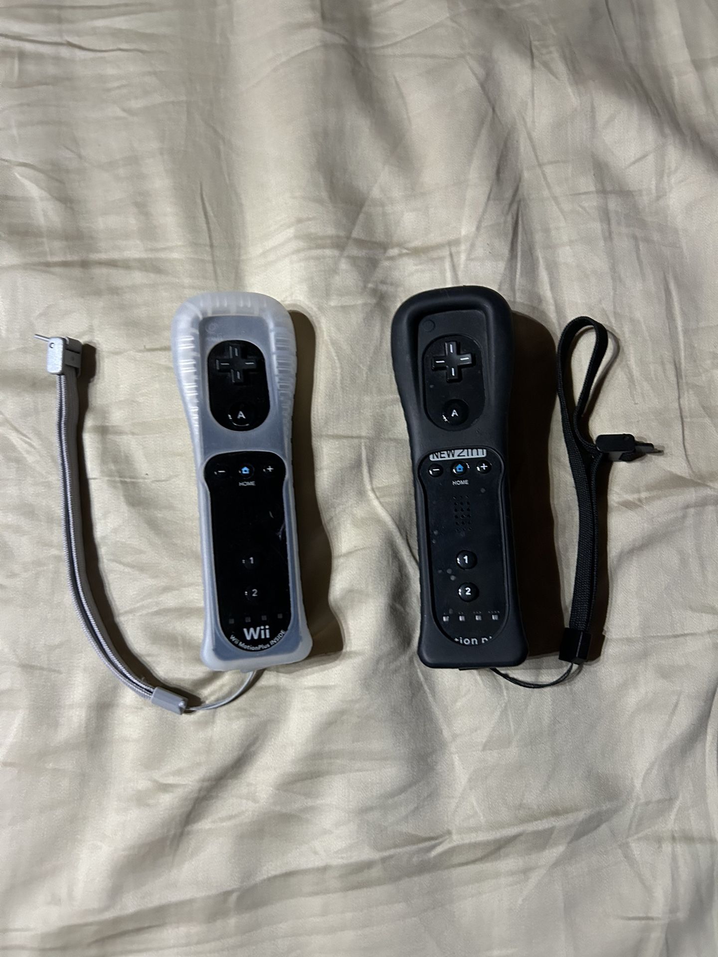 2 Wii Remotes w/ Motion Plus Inside and Protective Covers