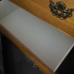 WOODEN DRESSER WITH CLEAN DRAWERS 