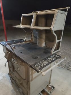 1933 model CA wrought iron stove company wood fired stovetop