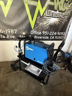 0255- Miller matic 142- MIG Welder and cart