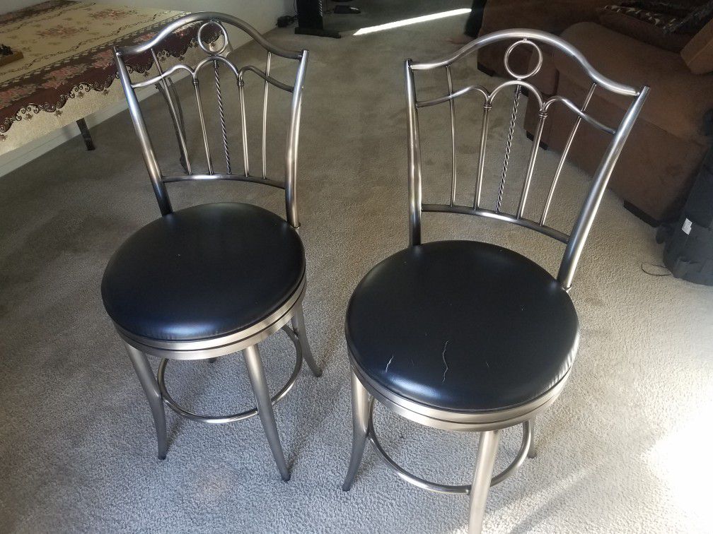 TWO 24" SWIVEL STAINLESS STEAL BAR STOOLS