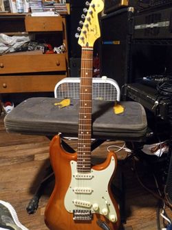 This is a mint condition fender american body with a  fender mexican neck  perfect shape sounds killer looks killer a steal at 500 cash
