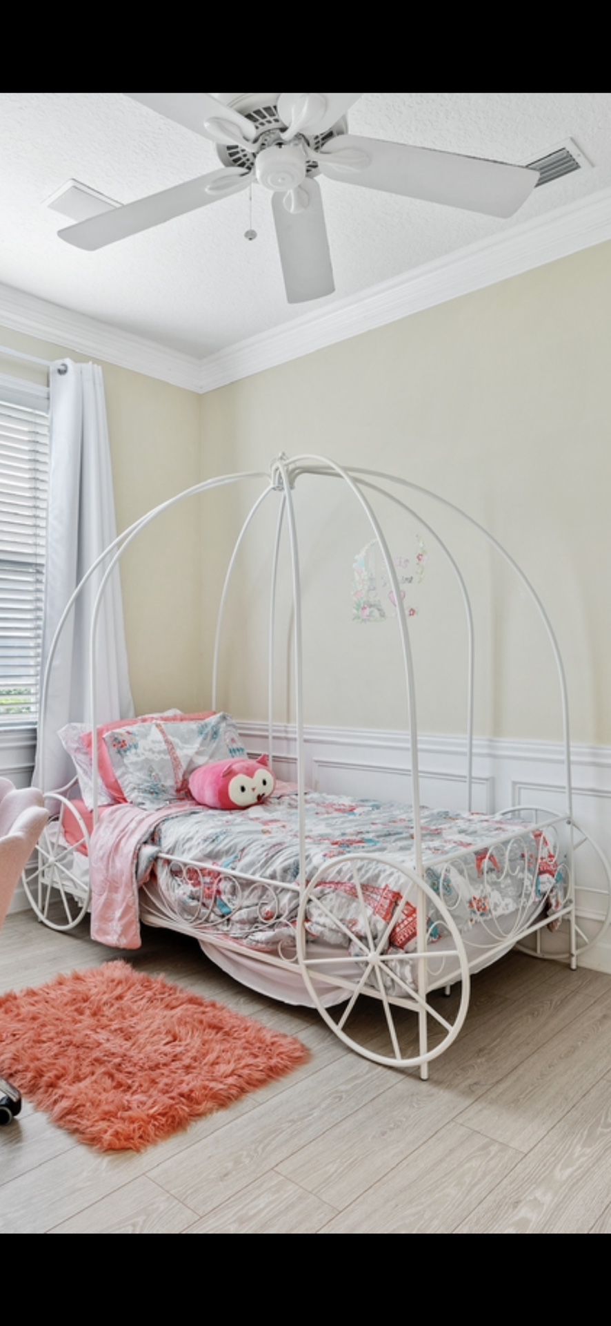 Whimsical Metal Twin Carriage Bed