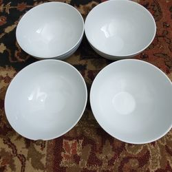 A set of 4 large glass bowls