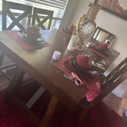 4 chaired mahogany dining table set. 