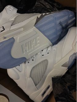white metallic jordan 5