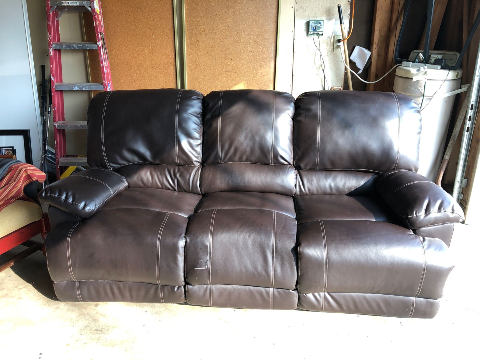 $50 Dark brown reclining couch with middle cup holders $50 Or Best Offer