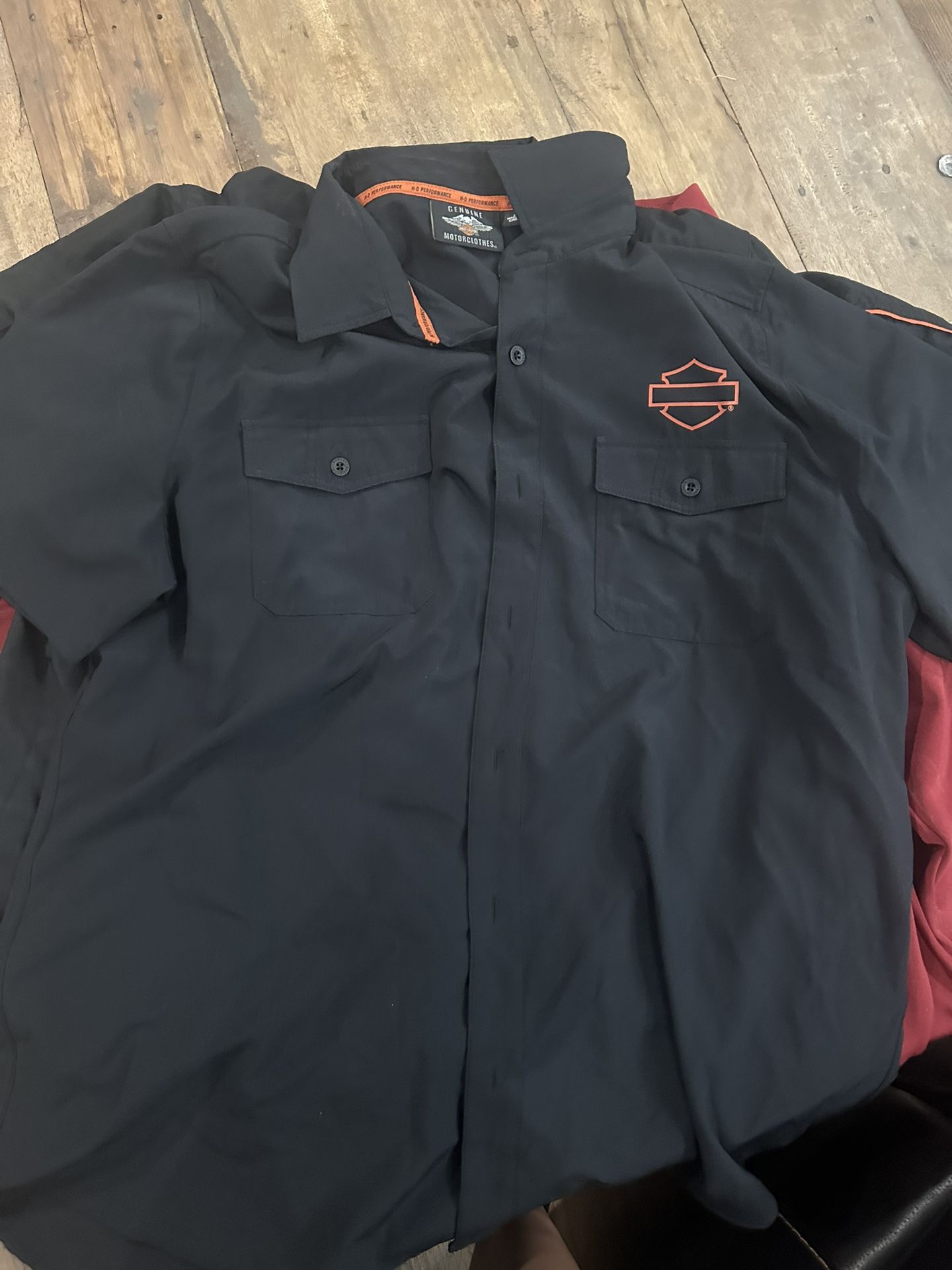 Two Harley Davidson shirts, one puma