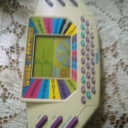 Tiger Handheld Wheel Of Fortune Game 