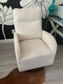 Cream Bouclé Swivel Rocking Chair