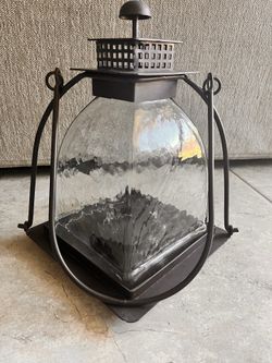 Unique candle holder with rippled textured glass