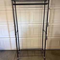 Amazon Basics Adjustable Double Rod Rolling Garment Rack, Hanging Clothes Closet Organizer with Wheels, Heavy Duty, 36" x 14" x 72", Black