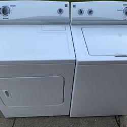 Top load Kenmore washer and dryer
