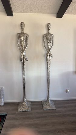 Raymond Waites 7ft Modern Figural Sculptures Pair of Large Silver Abstract Figure Sculptures