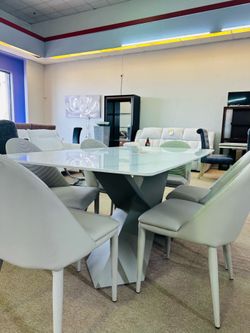 Brand new marble table & 6 leather chairs