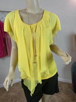 yellow blouse with necklace included
