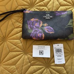 Coach Wristlet - Large Corner Zipper Wristlet - Beautiful rose floral pattern (Brand new) PRICE IS FIRM