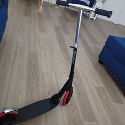 Black and red Razor big wheel Scooter