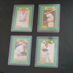 4 Hall Of Famer cards from 1987 in hard protective cases.  $10 each or $30 for all of them together.  Ruth, DiMaggio, Mantle and Mays.