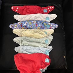 Charlie Banana Cloth Diapers – 7 Pack – Needs Elastic Repair  Lot of 7 Charlie Banana cloth diapers.  Well-known brand and great for someone who alrea