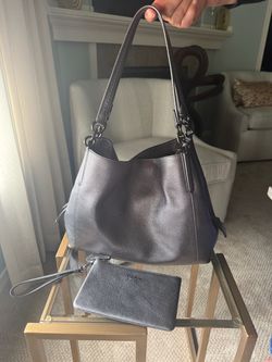 Coach purse with a matching wallet Coach purse with a matching wallet
