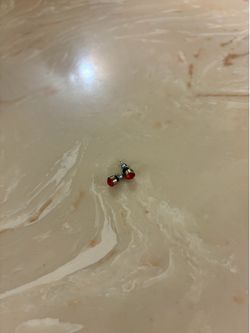 Red stud earrings